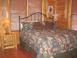 Second bedroom has king-sized bed, TV, DVD, & bathroom